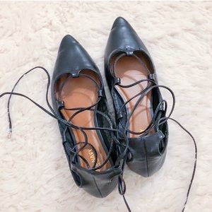 Lace up pointed black flats